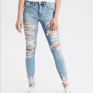 High waisted distressed jeans